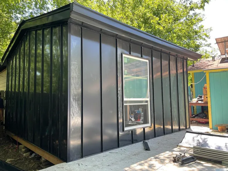 Black standing seam metal wall panels for Roof Inspection in Dayton